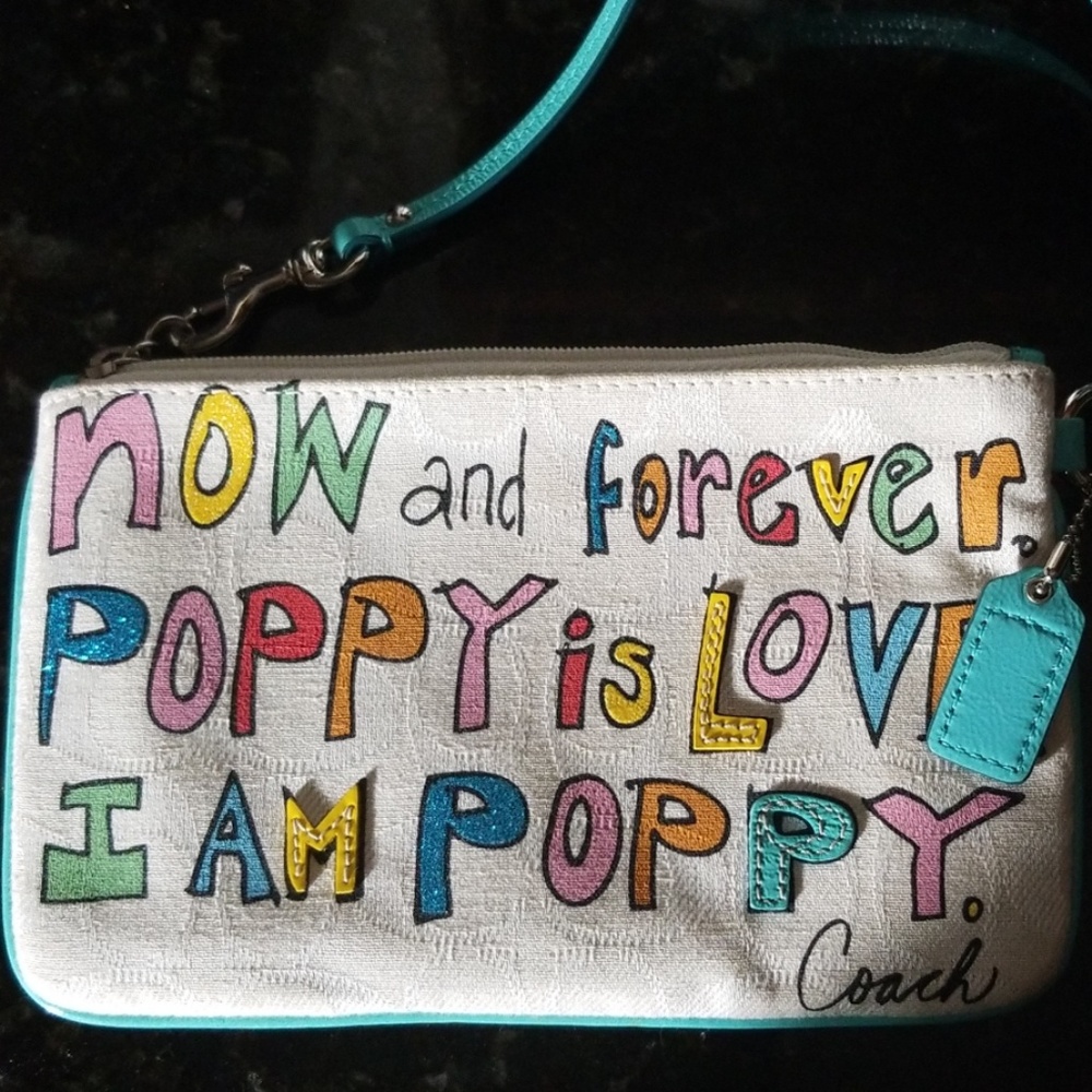Coach poppy wristlet Final price drop.